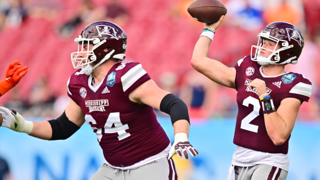 Will Rogers throws a pass for Mississippi State.