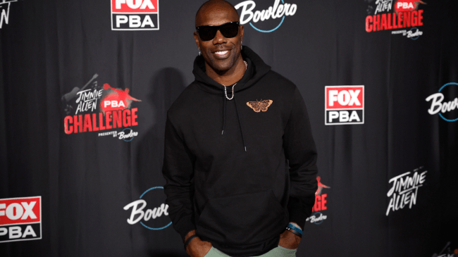 Terrell Owens poses for a photo.