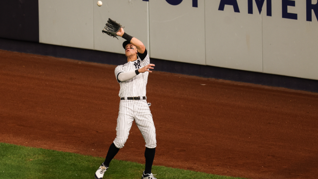 Aaron Judge catches a fly ball.