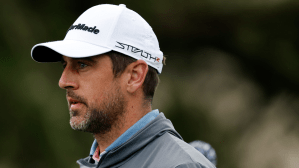 Aaron Rodgers plays golf.