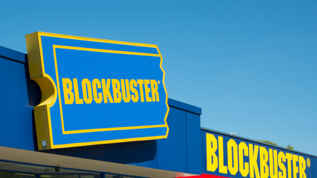 A Blockbuster logo on a storefront.