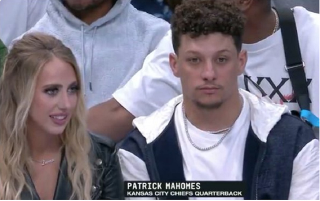 Brittany Mahomes sitting courtside with Patrick Mahomes 