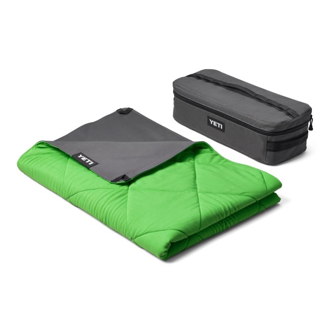 YETI Lowlands blanket in bright canopy green color with protective case