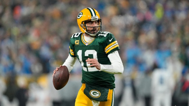 Aaron Rodgers throws a pass.