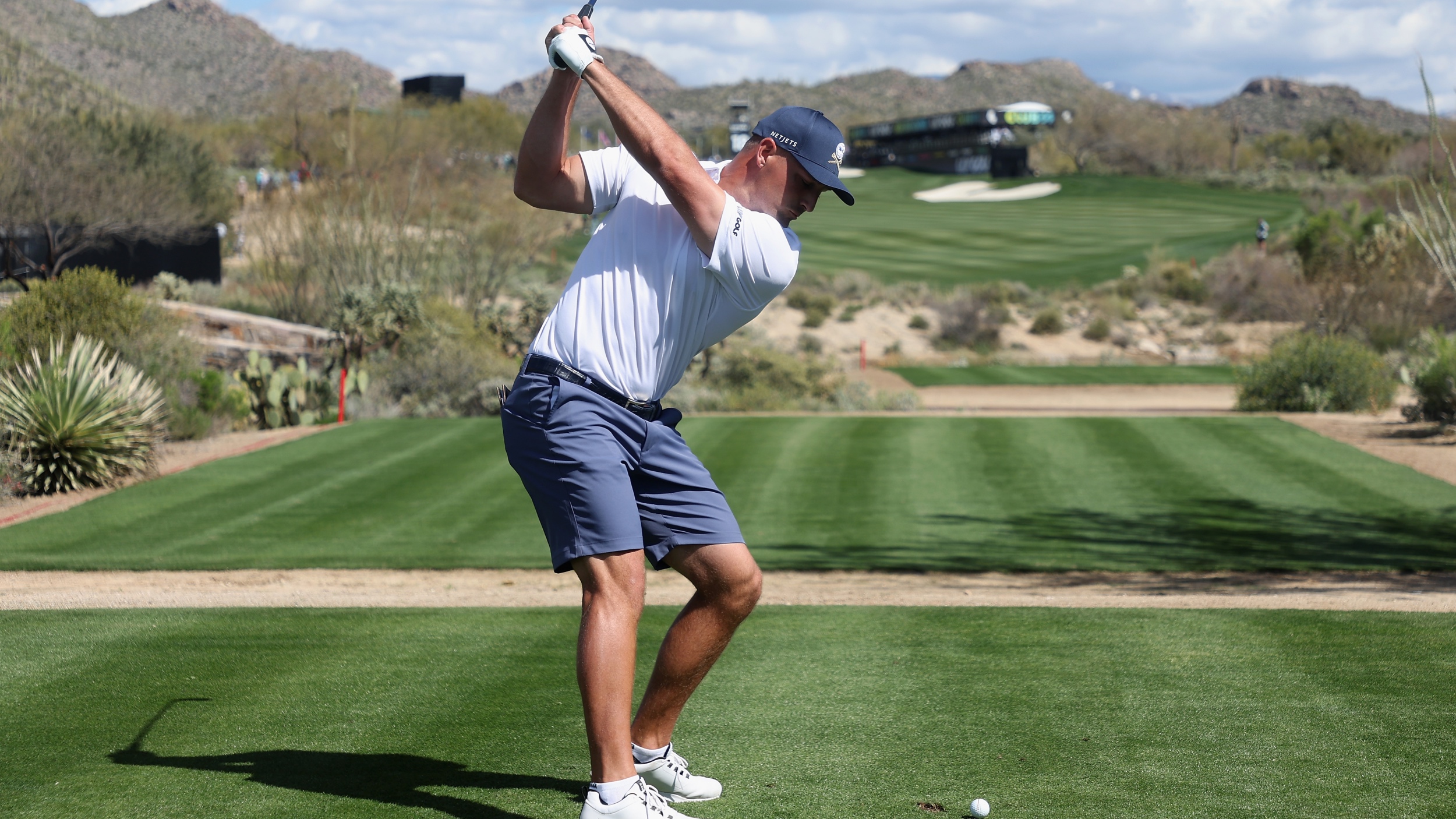 Bryson DeChambeau swinging a golf club