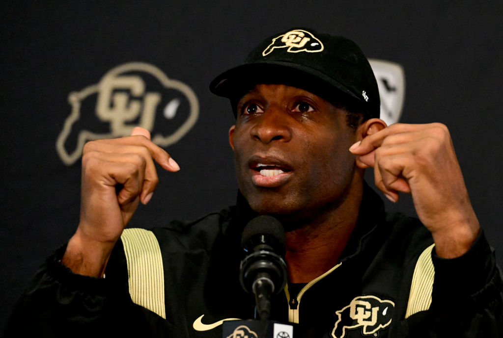 Deion Sanders talking during press conference