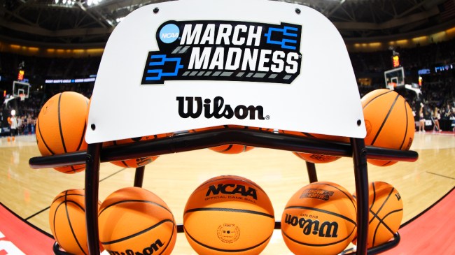A rack of basketballs with a March Madness logo.