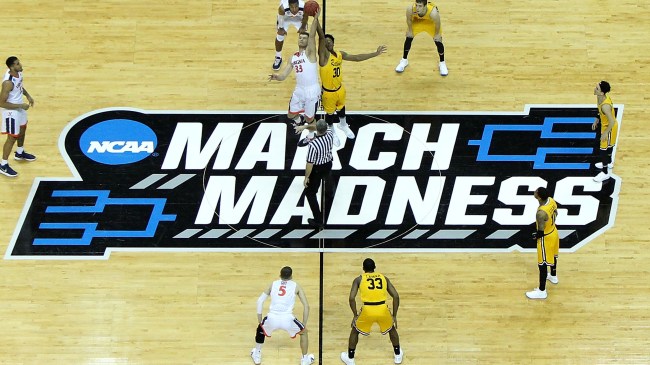 March Madness logo on basketball court