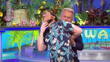 Pat Sajak Putting A Pro Wrestler In A Chokehold On ‘Wheel Of Fortune’ Becomes A Meme