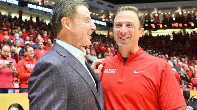 Richard and Rick Pitino chat after a game between New Mexico and Iona.