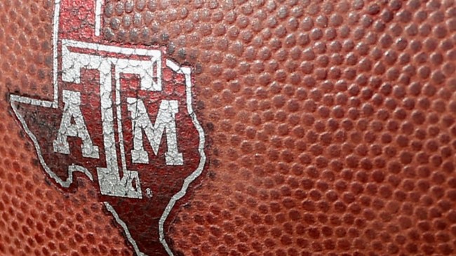 A Texas A&M logo on a football.