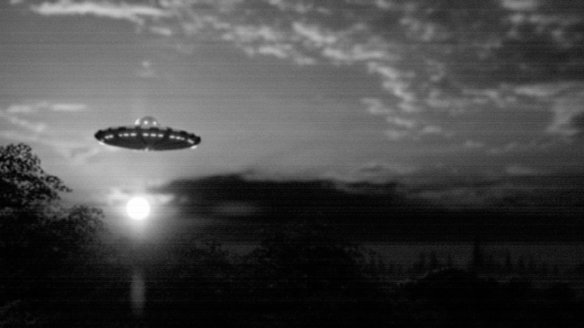 ufo in clouds black and white