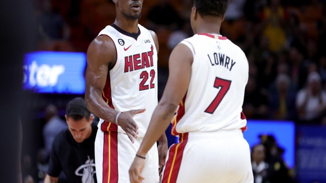 Kyle Lowry high fives teammate Jimmy Butler in Game 1 of the Heat's series vs. New York.
