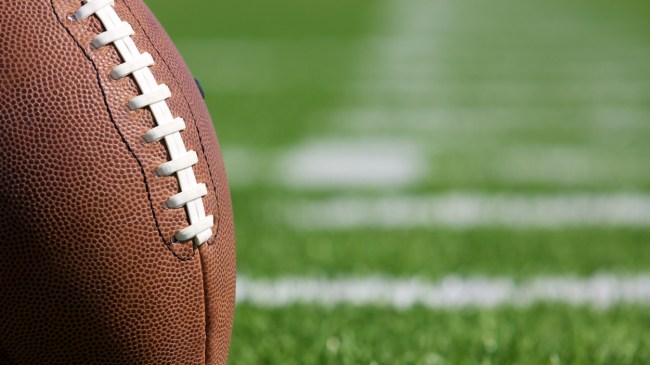 A football sits on the field.