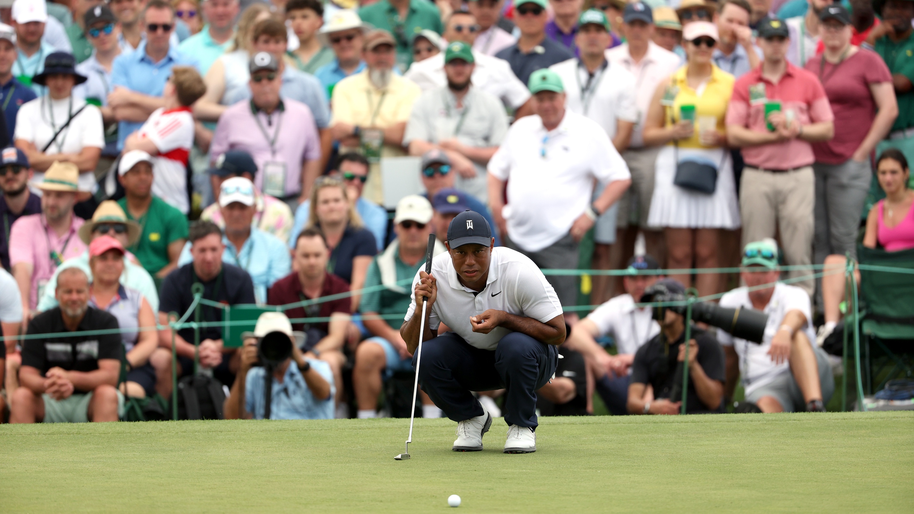 Tiger Woods reading a putt at The Masters