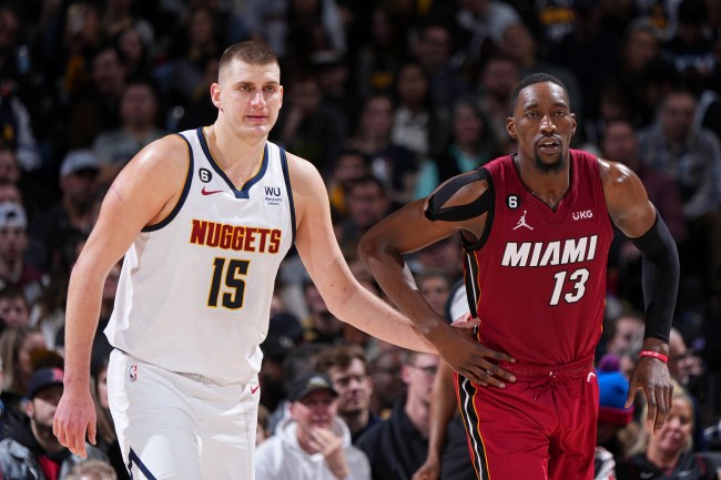 Nikola Jokic #15 of the Denver Nuggets and Bam Adebayo #13 of the Miami Heat look at each other during the NBA Finals. 