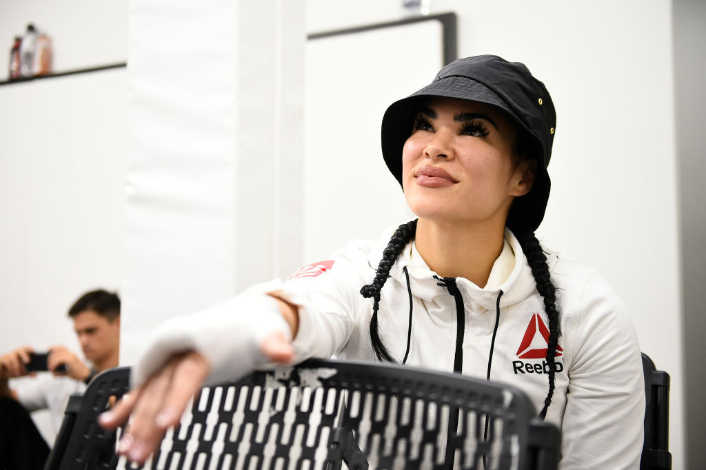 Rachael Ostovich getting her hands wrapped