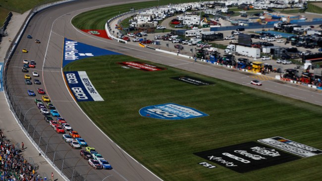 Drivers circle the track at the Kansas Speedway.