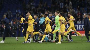 Barcelona Players Were Chased Off The Pitch By Rival Fans While Celebrating League Tilte Win