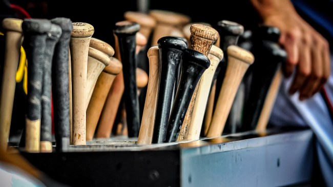 Baseball bats in the dugout.