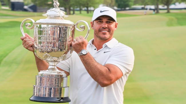 Brooks Koepka poses for a photo after winning the PGA Championship.