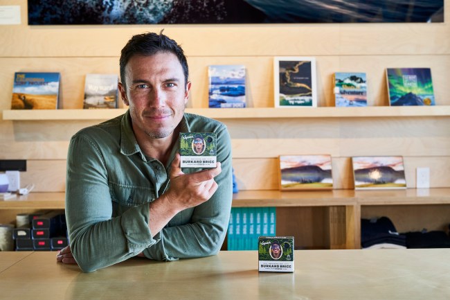 Outdoor photographer Chris Burkard holding his Dr. Squatch soap bar