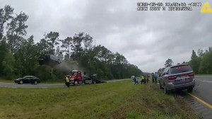 driver jumps tow truck ramp in Georgia