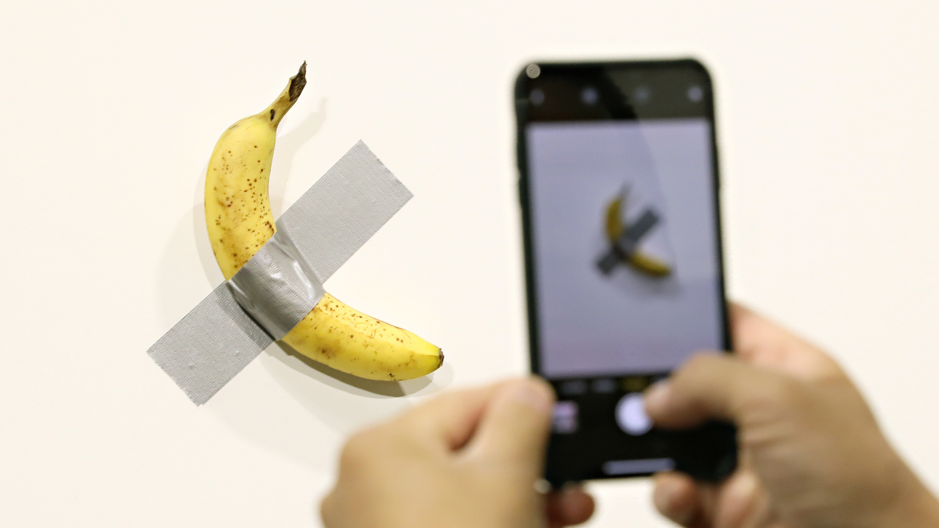 Hungry Guy Eats Banana Modern Art Piece That Sold For $120K