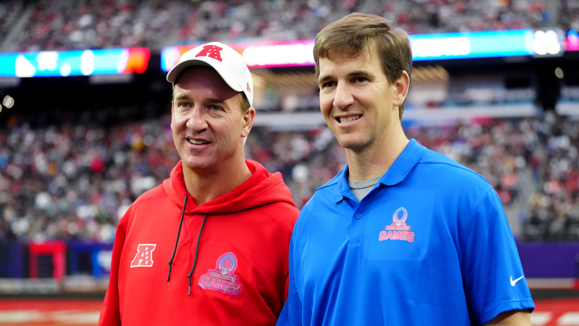 brothers Eli and Peyton Manning