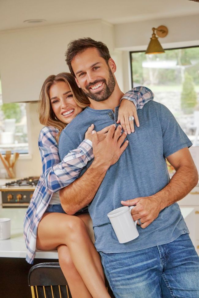 Eric Decker and his wife, Jesse James Decker pictured in a kitchen