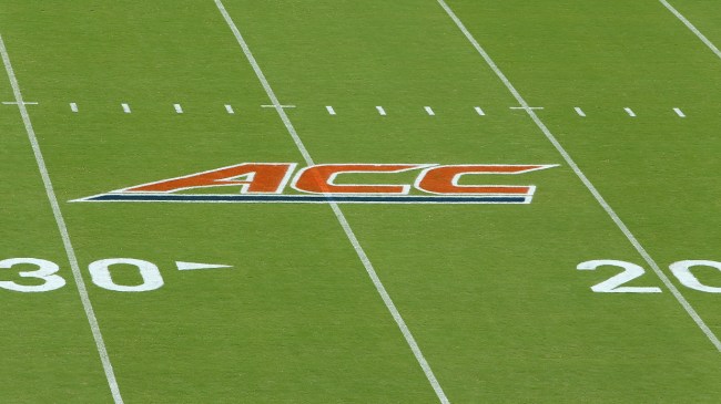 A ACC logo on the football field.