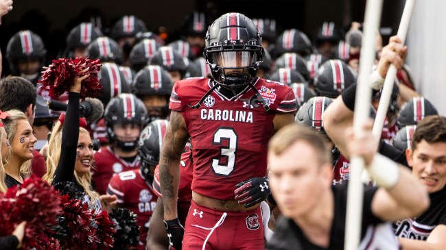 Juice Wells leads the South Carolina Gamecocks onto the field for the Gator Bowl.