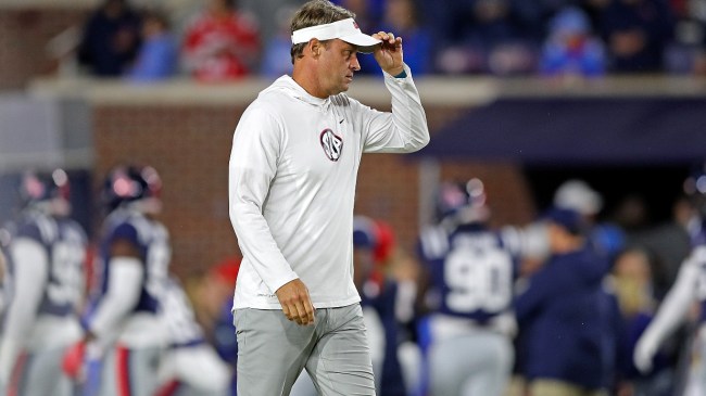 Lane Kiffin walks the field at an Ole Miss game.