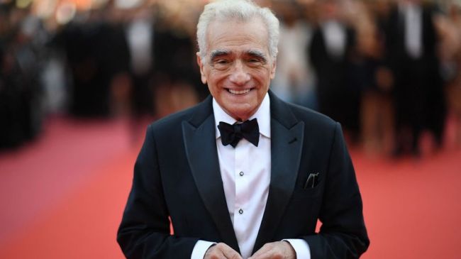 martin scorsese wearing a tuxedo on a red carpet