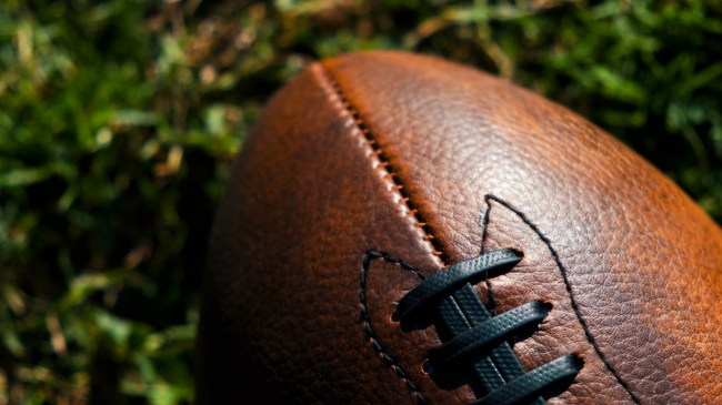 A football sits on the field.