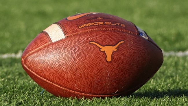 A Texas Longhorns logo on a football.