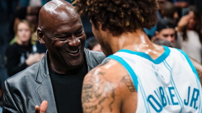 Michael Jordan with Hornets player Kelly Oubre Jr.