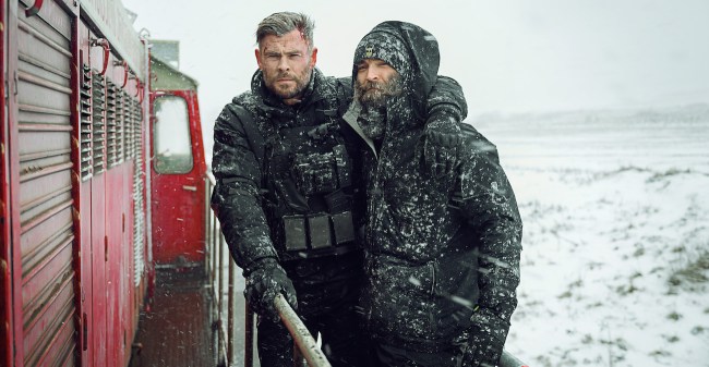 Chris Hemsworth as Tyler Rake and Director Sam Hargrave on the set of Extraction 2