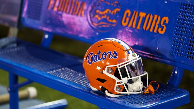 A Florida Gators football helmet on the bench.