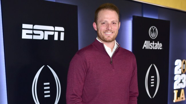 Greg McElroy poses for a photo at an ESPN college football event.