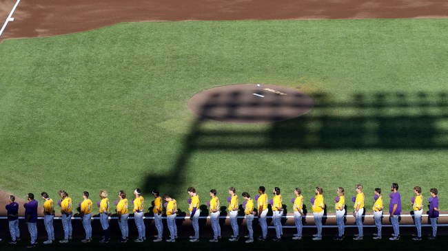 The LSU baseball stands for the national anthem before a game.