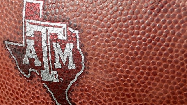 A Texas A&M logo on a football.