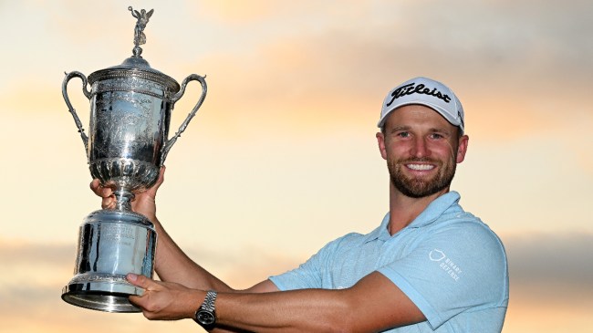 Wyndham Clark poses for a photo with his US Open trophy.