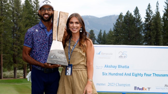 Akshay Bhatia hoists the Barracuda Championship trophy alongside girlfriend Presleigh Schultz.