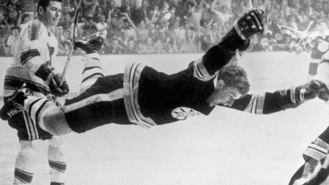 Bobby Orr flies through the air after scoring a goal to win the Stanley Cup
