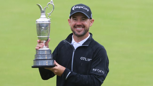 Brian Harman hoists the Claret jug after his win at the Open Championship.