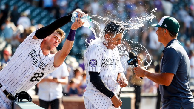 Alan Trejo has water poured on him after hitting a game-winning home run.