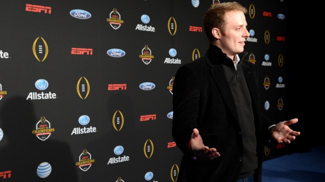 Greg McElroy poses for a photo at an ESPN College Football Playoff event.