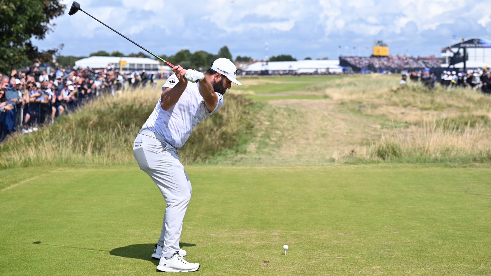 Jon Rahm teeing off at the Open Championship at Royal Liverpool Golf Club
