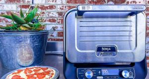 Ninja Woodfire Outdoor Oven with a pizza